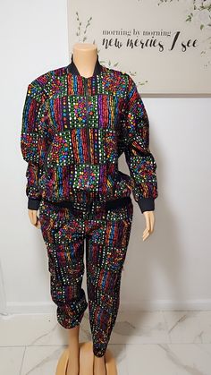 Ankara 2-piece set, Top and Pant Ankara print African Fashion. African matching set. Casual Patterned Printed Sets, Casual Multicolor Printed Pant Set, Multicolor Printed Cotton Pant Set, Multicolor Matching Pant Set For Spring, Cotton Two-piece Set With Long Sleeves, Green Two-piece Long Sleeve Pant Set, Black Matching Set With Long Sleeves, Black Long Sleeve Matching Set, Multicolor Two-piece Pant Set For Spring