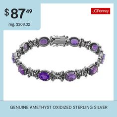 Fashioned from oxidized sterling silver, this amethyst tennis bracelet goes beyond ordinary with ornate detailing.Stones: 8x6mm oval genuine amethystGemstones may be treated and may require special care.Jewelry photos are enlarged to show detail.Features: Quick ShipJewelry Closure: Box ClaspLink Construction: SolidSetting: ProngStone Cut: OvalChain Length: 7 1/4 InchCare: Wipe CleanAuthenticity: Genuine StoneBirthstone: February BirthstoneBracelet Type: Tennis BraceletsMetal: Sterling SilverCou… Bracelets Tennis, Silver Tennis Bracelet, Jewelry Photos, Tennis Bracelet, Color Purple, Amethyst, Sterling Silver, Purple, Silver