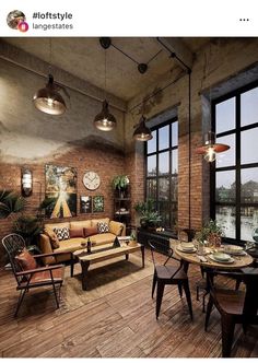 a living room filled with furniture and lots of windows next to a wooden floor covered in potted plants