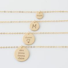 "CLASSIC GOLD DISC NECKLACE Choose your disc size! Our engraved disc necklaces come in 4 sizes, mini 3/8\", small 1/2\", medium 5/8\"or large 3/4\". Engraved and hand assembled with care and love, it comes in 14k gold fill, rose gold fill, or sterling silver. Perfect for layering with our bar necklaces and dainty stone necklaces. * Listing is for one disc necklace, your choice of size HOW - TO - ORDER 1. Select your options from the drop down menu see photo for font styles and symbol options 2. Engraved Round Disc Necklace As Gift For Mom, Customizable Gold Necklace Gift For Mom, Gold Customizable Charm Necklaces With Round Pendant, Customizable Gold Charm Necklace With Round Pendant, Personalized Gold Coin Necklace In Minimalist Style, Gold Hand Stamped Round Disc Charm Necklace, Personalized Gold Minimalist Coin Necklace, 14k Gold Name Necklace With Round Shape, Personalized Minimalist Gold Coin Necklace