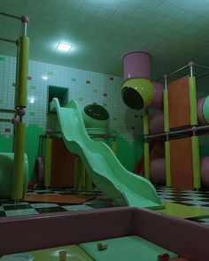 a children's play area with slides and toys