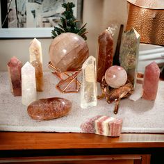 Enhances Intentions: Amplify and manifest your desires.  	Energizes and Harmonizes: Balance and uplift your space.  	Aesthetic Elegance: Stunning decor with powerful energies. Crystal Corner Decor, Amethyst Decor, Space Aesthetic, Corner Decor, Crystals In The Home, Quartz Sphere, Crystal Set, Strawberry Quartz, Stone Decor