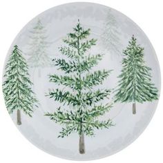 a white plate with trees painted on it