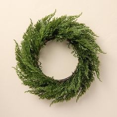 a close up of a wreath on a wall with no one in the photo looking at it