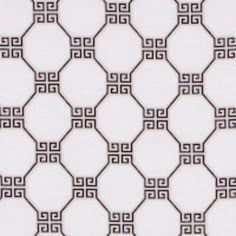 a white and black wallpaper with an intricate design