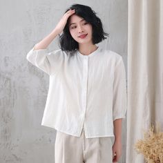 "Soft and comfy women linen blouse for summer, casual style blouse, loose fit size. Details: * linen shirt * rolled collar * 3/4 length sleeves * front button closure * loose and comfortable * causal women style * The model is 170cm (5′7″) tall with a 84cm (33\") bust, 66cm (26\") waist. She is wearing in size XS. Choose CUSTOM Order if you * Can't find your size in our size Chart * Your Height is not Between 5'1\" - 5\"9\" * Your weight is over 80kg SIZE GUIDE Size vary between Brand and Countr Summer Ramie Blouse, Relaxed Fit Ramie Blouse, Summer Relaxed Fit Plain Blouse, Long Sleeve Ramie Blouse For Summer, Summer Long Sleeve Ramie Blouse, Casual Ramie Top For Spring, Solid Ramie Tops For Spring, Casual Ramie Tops For Daywear, Plain Blouse For Daywear