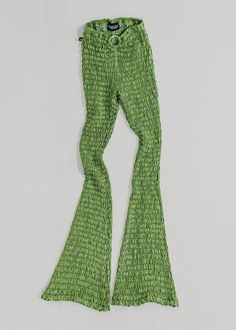 a pair of green bell bottoms on a white background with the bottom part partially open