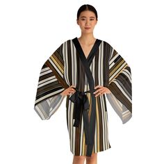 Whether it's lounging at home or making a stylish appearance, these kimono-style robes are as beautiful as they are cozy. With a figure-flattering shape, this chic mid-length robe features the signature flowing bell sleeves and a belt, making it an absolute delight for Japanese style enthusiasts. Each kimono is 100% made with Polyester for that smooth & silky feel. .: 100% polyester .: Light fabric (4.72 oz/yd²(160g/m .: Figure-flattering and versatile shape .: Smooth feel .: NB! Front edge and Multicolor Wrap Robe For Loungewear, Fall Loungewear Robe With Kimono Sleeves, Belt Making, Mode Kimono, Long Sleeve Kimono, Style Japonais, Sporty Hairstyles, Kimono Style, Artistic Hair