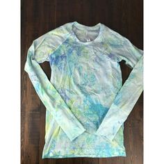 Seawheeze 2019 Tie Dye Shirt New Lululemon Seawheeze 2019 Half-Marathon Swiftly Long Sleeve Shirt *Sw Wht/Wht/Mdby. Rare Special Event Limited Edition. White With Green, Yellow, And Blue Tie Dye Swirl Pattern. Size Women's 6. Spring Long Sleeve Tops By Lululemon, Lululemon Fitted Tops For Athletic Use, Fitted Lululemon Tops For Light Exercise, Lululemon Stretch Tops For Light Exercise, Lululemon Athleisure Tops For Spring, Lululemon Spring Athleisure Activewear, Lululemon Moisture-wicking Tops, Lululemon Crew Neck Tops With Thumbholes, Lululemon Long Sleeve Moisture-wicking Top