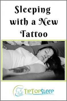 a woman laying on top of a bed with the words sleeping with a new tattoo