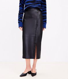 In luxe faux leather, this midi skirt wraps up your look with sleek and chic modern edge. Side slit. Back zip. Lined.,Imported:Imported,Fit:Fit: Straight - fits straight & loose,Length:35" long,Fabrication:Shell :Imitation Leather Coating: Polyurethane, Back: 100% Polyester, Linging:100% Polyester,Garment Care:Machine Washable Loft Tall Faux Leather Midi Wrap Skirt Size 4 Black Women's by Loft Size Regular - 4 Black Women's Midi/Maxi, Skirt, Shell, :Imitation, Leather, Coating:, Polyurethane, Ba Tall Skirt, Faux Leather Midi Skirt, Midi Wrap Skirt, Social Dresses, Scarf Sale, Petite Skirt, Grey Outfit, Blazer With Jeans, Women Midi