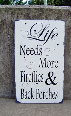 a sign that says life needs more fireflies and back porches