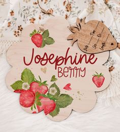 a wooden sign with strawberries on it that says, josephine be my mommy