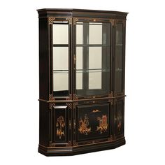 a black and gold china cabinet with glass doors