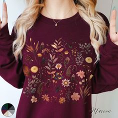 Autumnal Wildflowers Unisex Crewneck Sweatshirt | Botanical Wildflower Nature Lover Jumper | Autumn Sweatshirt  ✔️ Super comfy unisex heavy blend crewneck sweatshirt  ✔️ 50% cotton 50% polyester ✔️ Medium-heavy fabric (8.0 oz/yd² (271.25 g/m ✔️ No side seams ✔️ Ribbed knit elastic collar to help collar retain its shape ✔️ Sewn-in label 📏 Runs true to size ✨ Care instructions: Machine wash: cold (max 30C or 90F). Turn inside out before washing to protect the print. Non-chlorine: bleach as needed Floral Print Long Sleeve Sweatshirt For Fall, Cotton Floral Print Sweatshirt For Fall, Botanical Relaxed Fit Tops For Fall, Flower Shaped Relaxed Fit Sweatshirt For Fall, Relaxed Fit Flower Sweatshirt For Fall, Fall Cotton Sweatshirt With Plant Print, Botanical Style Cotton Sweatshirt For Fall, Cotton Sweatshirt With Plants Print For Fall, Botanical Long Sleeve Tops With Plant Print