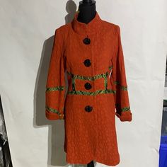 Designer A Line An Ren Textured Coat With Line Green Trimming. No Pockets. Shoulder Width 16” Winter Orange Patchwork Outerwear, Orange Patchwork Outerwear For Winter, Orange Patchwork Outerwear For Spring, Orange Long Sleeve Outerwear For Spring, Fitted Casual Orange Outerwear, Casual Fitted Orange Outerwear, Fitted Orange Long Sleeve Outerwear, Long Sleeve Orange Outerwear With Buttons, Orange Long-sleeve Outerwear With Buttons