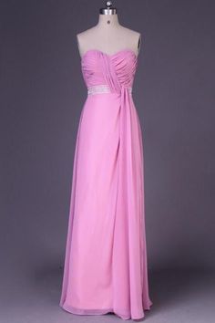 a pink dress on a mannequin dummy