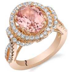 a ring with an oval shaped pink stone surrounded by white and rose gold diamond accents