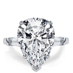 a pear shaped diamond ring with side stones