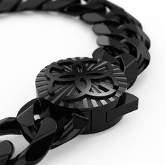 The 15mm Cuban Bracelet is crafted from 316L stainless steel, the same premium material used in high-end Swiss watches. Available in three sizes S (17.5 cm), M (19 cm), and L (20.5 cm), this bracelet combines durability with bold style, perfect for making a striking statement. Luxury Stainless Steel Chain Bracelet With Solid Links, Adjustable Black Enamel Modern Bracelets, Luxury Stainless Steel Chain Bracelet, Modern Black Stainless Steel Wristband, Modern Adjustable Black Enamel Bracelets, Luxury Metal Bracelets With Black Enamel, Timeless Bracelets With Stainless Steel Clasp, Black Metal Bracelets Tarnish Resistant, Black Jewelry With Stainless Steel Clasp