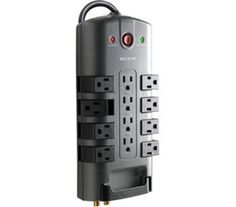 an electrical device is plugged into the wall with multiple outlets and surge protectors