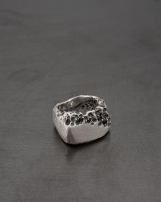 Partially eroded. Bitten. Rectangular shaped on top. Rough textured. Matte finished. 2 x 2mm + 2 x 2,5mm genuine black diamonds. Approximately 22mm x 14mm on top Hand carved and finished using artisan techniques. Oxidized for texture enhancement. Polished on the inside. Made of .925 sterling silver Note that all products are made to order. Please allow approximately 3-6 weeks for production depending on current demand.Handcrafted and unique, therefore may have some deviations from given pictures Diamond Signet Ring, Handcrafted Rings, Black Diamonds, Signet Ring, Artisan Jewelry, Black Diamond, Ring Necklace, Women Rings, Hand Carved