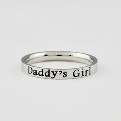 "This listing is for one stainless steel band ring, engraved with \"Daddy's Girl\". Materials & Features: This ring is made of high quality hand polished solid stainless steel, which is hypoallergenic (good for metal-sensitive skin). Stainless steel will not tarnish, its luster and durability will make it last for many years. The black text on the ring will not fade out over time. Sizes: This ring is 3 mm wide, dainty and cute, with smooth rounded edge on the inside for comfort fit. Please Note: Sisters Best Friends, Daughter Ring, Until The Very End, Jewelry Quotes, Friend Friendship, Stacking Bands, Fade Out, Wide Rings, Star Ring