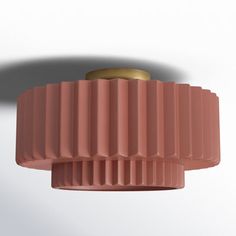 an overhead view of a pink light fixture