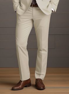 Cherish comfort and a smart appearance with our Army Khaki Stretch Chino Suit, which embraces the feel of natural cotton and the essence of effortless style. Customized from a blend of cotton and lycra, our suit features comfortable draping and a soothing khaki hue that reflects the calm of nature. It is perfect for casual outings, formal engagements, and laid-back gatherings. Ready to modernize your wardrobe? Shop now and find your stride with our suit that reflects confidence.  Look Includes    Army Khaki Stretch  Chino Fabric  Two Button Jacket Style  Notch Lapel   Corozo     Beige  Buttons  Single Vent  Three Cuff Buttons  Two Welted Back Pockets on Trousers    Click 'Customize Now' to modify the look if needed.    Lining: Viscose; Dry Clean. Fabric Cross, Master Tailor, Suit Ideas, Italian Suit, Wedding Suit, Button Jacket, The Calm, Stretch Chinos, Chino Pants