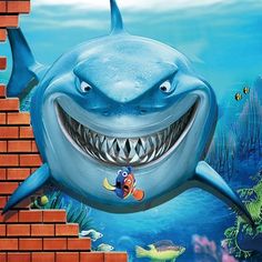 an image of a shark on the brick wall with other fish around it and under water