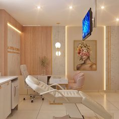 a living room with white furniture and a flat screen tv mounted to the wall above it