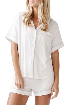 These comfy, stretchy and totally breathable pajamas feature a button-up top and drawstring shorts. Top has notched collar; short sleeves 95% viscose, 5% spandex Machine wash, tumble dry Imported Knit Pajamas, Pajamas Short, White Pajamas, Womens Pajama Shorts, Bamboo Pajamas, Soft Pajamas, Soft Clothes, Ivory Tops, Short Pajama Set