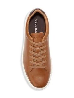 This version of Cole Haan’s popular 'Grand Crosscourt' sneakers are a must-have for any sneaker aficionado. Made from supple, yet durable leather, they're constructed in a streamlined tennis shoe shape that will never date..Leather upper.Round toe.Lace-up vamp.Lining: Polyester.Ethylene-Vinyl Acetate (EVA) sole.Imported.This version of Cole Haan’s popular 'Grand Crosscourt' sneakers are a must-have for any sneaker aficionado. Made from supple, yet durable leather, they're constructed in a stream Brown Sneakers With Gum Sole For Spring, Brown Gum Sole Sneakers For Spring, Brown Sneakers With Contrast Sole For Spring, Spring Brown Sneakers With Contrast Sole, Spring Brown Sneakers With Plain Toe, Brown Plain Toe Sneakers For Spring, Eva Sole, Cole Haan Shoes, Personal Shopping