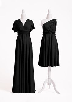 two mannequins dressed in black dresses on white display stands, each wearing a one shoulder dress