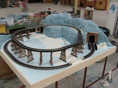 a model train set on display in a building