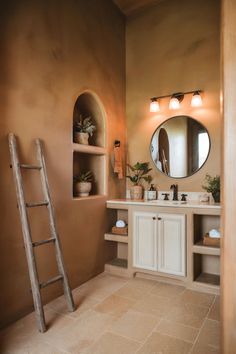 A bathroom with light brown walls, neutral tones, and modern accents, showcasing sleek brown bathroom designs. Light Brown Bathroom, Brown Bathroom Walls, Bathroom Walls, Inspiration Wall