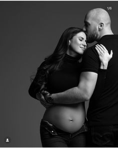 a man and woman embracing each other in black and white with the caption'baby, maternity photography '