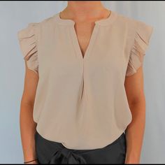 Brand New In Bag. This Zenana Blouse Is A Gorgeous Blush Color. Loose Fit. Hangs Slightly Lower In The Back. Summer Office Blouse With Ruffle Sleeves, Chic Workwear Blouse With Flutter Sleeves, Chic Flutter Sleeve Blouse For Work, Elegant Flutter Sleeve Blouse For Day Out, Feminine Beige Blouse With Flutter Sleeves, Feminine Beige Flutter Sleeve Blouse, Elegant Beige Ruffle Sleeve Tops, Light Blue Blouse, Teal Blouse