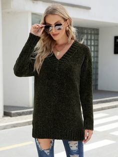 Upgrade your wardrobe in the Cold Day Glam Chenille Pullover Sweater in dark green that features a classic V neckline. Size Guide: Demi is 5’6” tall, and has a 33.5” bust, 24.8”waist, & 37.4” hips. She is wearing a S / US 4 / AU 8. This sweater is true to size. Material: 100% polyester. Key Features: Relaxed fit. Long sleeve. Glam material. Care Instructions: Machine wash / Cold hand wash Green V-neck Sweater For Fall, Green V-neck Winter Sweater, Green V-neck Sweater For Winter, Dark Green Tops For Fall, Green Long Sleeve V-neck Sweater For Fall, Loose Pullover Sweater, Plus Size Cosplay, Plaid Pullover, Faux Leather Dress