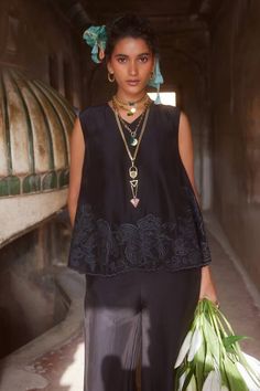 Black cami top with floral embroidered hem. Paired with a trouser with cutwork embroidered hem. - Aza Fashions Chic Sleeveless Embroidered Top, Elegant Sleeveless Embroidered Top For Festive Occasions, Elegant Summer Sets With Embroidered Hem, Elegant Spring Sets With Embroidered Neckline, Embroidered Cami Top, Trouser Pattern, Black Cami Top, Black Camis, Silk Organza