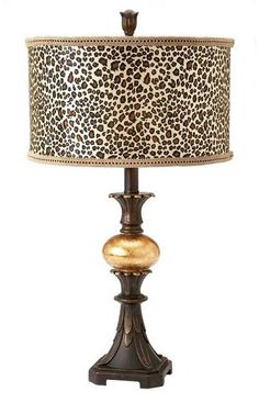 a lamp with a leopard print shade on it