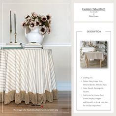 a table with a vase and flowers on it next to a striped table cloth that has fringe trim around the edge