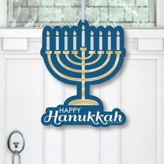 a hanukkah menorah hanging from a door