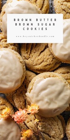 cookies with white frosting on top and flowers in the background text reads, brown butter browns sugar cookies