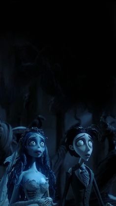 the corpse bride and groom are standing next to each other in front of a dark background