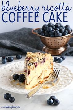 a slice of blueberry ricotta coffee cake on a plate