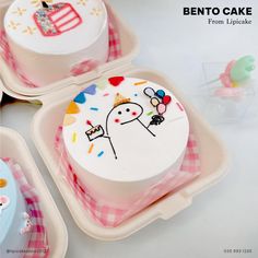 three birthday cakes in plastic containers with designs on the top and bottom, sitting on a table