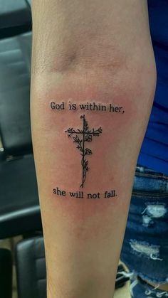 a cross with the words god is within her, she will not fail