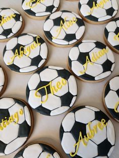 decorated cookies with soccer balls and name on them