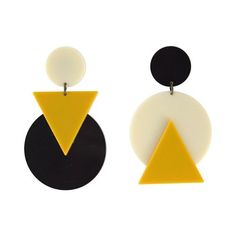 two pairs of earrings with black, white and yellow shapes on the bottom of each ear